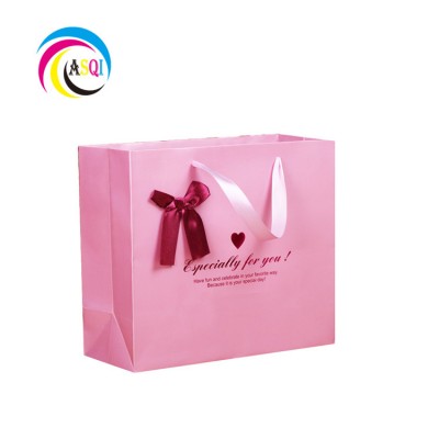 Custom Logo Printed Matt Laminated Pink   luxury Paper Shopping Bag  gift bag with bow tie ribbon